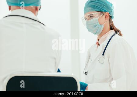 medical colleagues discussing something in the lab. Stock Photo