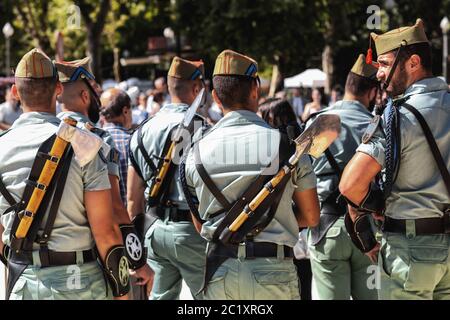 Seville, Spain - May 30, 2019: Spanish legion soldiers (unit of the Spanish Army and Spain's Rapid Reaction Force.)  during display of Spanish Armed F Stock Photo