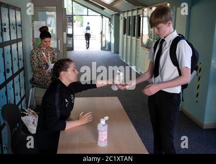 A teacher gives class to his pupils on the first day of the school year on  September 2, 2019 at Toussaint Louverture school in Clichy-la-Garenne,  north of Paris. - In France some