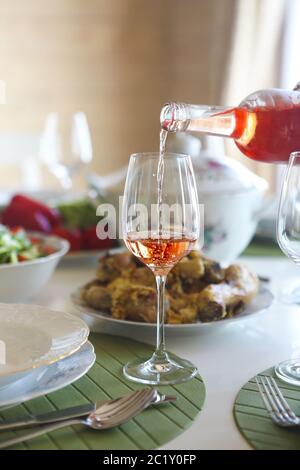 Friends clinking glasses with rose wine at Christmas, square crop stock  photo (222245) - YouWorkForThem