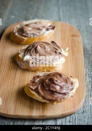 Slices of bread with chocolate cream Stock Photo