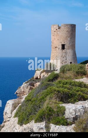 Torre Del Cap Blanc medieval watchtower, built on a coastal cliff top in 1584, near Llucmajor, Mallorca south coast, August 2018. Stock Photo