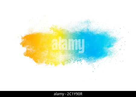 Colored powder explosion. Abstract closeup dust on backdrop. Colorful explode. Paint holi Stock Photo
