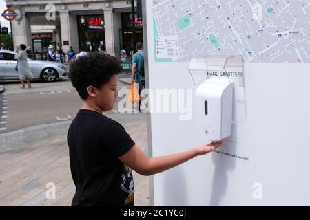 Oxford Street, London, UK. 16th June 2020. Coronavirus pandemic: New hand sanitiser stations in London, non essential shops re-opened on the 15th June. Credit: Matthew Chattle/Alamy Live News Stock Photo