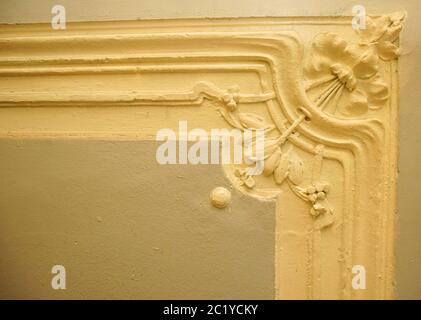 Fragment of wall decoration on the main staircase of the building in Art Nouveau style on 7th Krasnoarmeiskaya Street