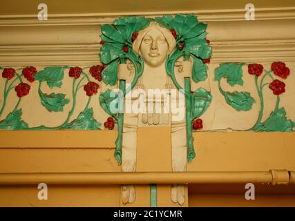 Fragment of wall decoration on the main staircase of the building in Art Nouveau style on 7th Krasnoarmeiskaya Street