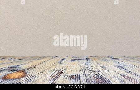 washed wood table with concrete texture background. Stock Photo