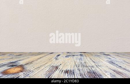 washed wood table with concrete texture background. Stock Photo
