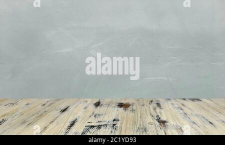 washed wood table with concrete texture background. Stock Photo