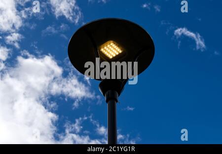 Street lamps with modern Led light on sky background Stock Photo