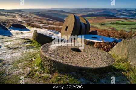 Abandoned Millstones at Stanage Edge, the Peak District, England Stock Photo