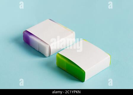 Natural cosmetic skin product handmade soap bar with paper label on a pastel blue background. Mock-up for your design and creativity. Stock Photo