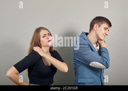 Holds the shoulder hurts, pain in my arm, sore point, problem with health care Stock Photo