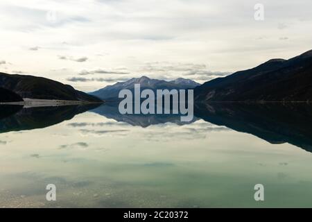 Reflections at Lake Muncho in Canada Stock Photo