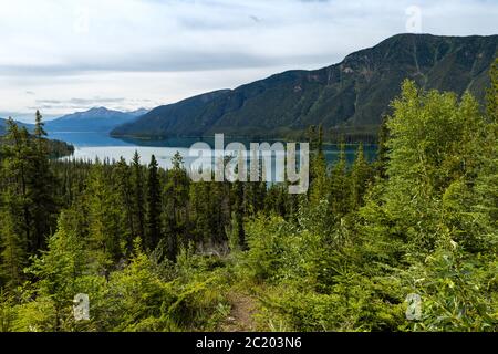 Reflections at Lake Muncho in Canada Stock Photo