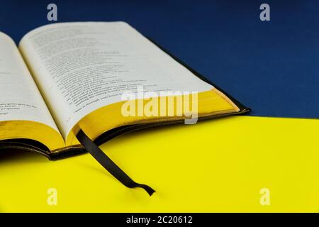 NewYork NY JUNE 11 2020: Opened Bible with on a religious holy book Stock Photo