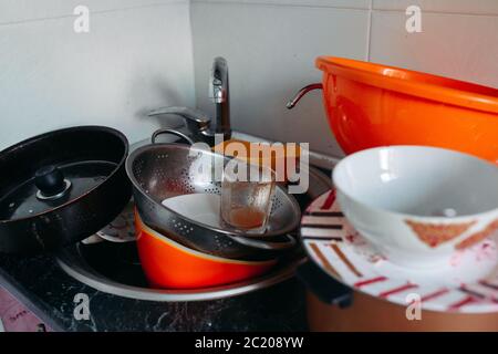 huge heap of dirty dishes waiting for the washing Stock Photo