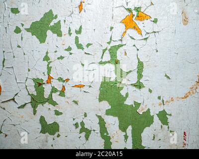 Texture of blue cracked paint on the wall. Stock Photo