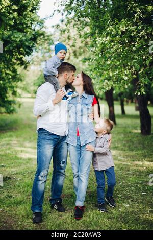 Portrait of happy family, wearing in casual clothes, spending time together. Stock Photo