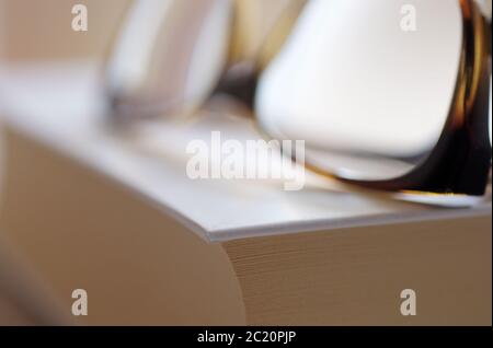 eyeglasses on book Stock Photo