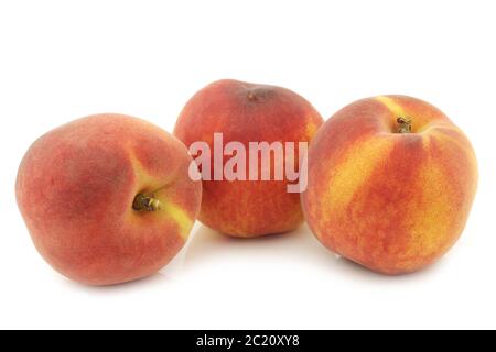 fresh nectarines on a white background Stock Photo