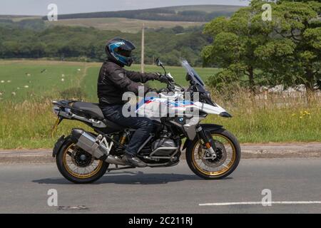 BMW  R 1250 GS Rallye TE; Motorbike rider; two wheeled transport, motorcycles, vehicle, roads, motorbikes, bike riders motoring in Chorley, UK Stock Photo