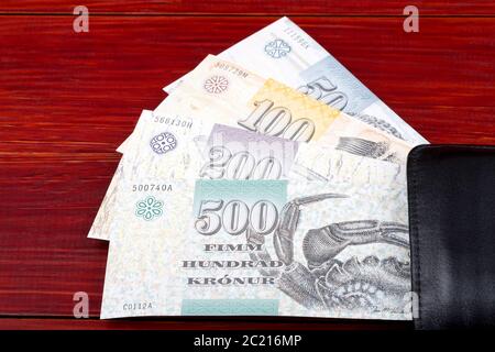 Faroese krona in the black wallet Stock Photo - Alamy