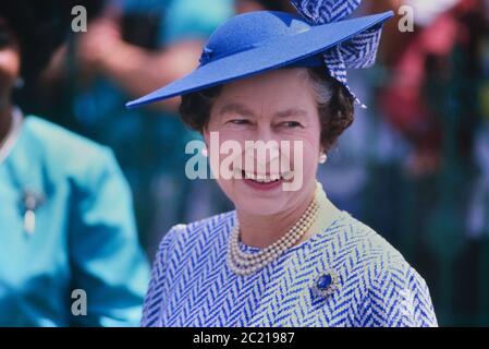 A cheerful HRH Queen Elizabeth II wearing a hat by milliner Philip Somerville. Royal visit to Barbados 8-11th March 1989 Stock Photo