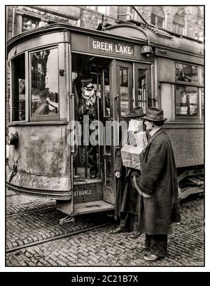 Archive Spanish Flu 1918 photo Precautions taken in Seattle, Washington USA during the Spanish Influenza epidemic rules forbade anyone to ride on the street cars without wearing a mask. Conductor refusing to take a passenger
