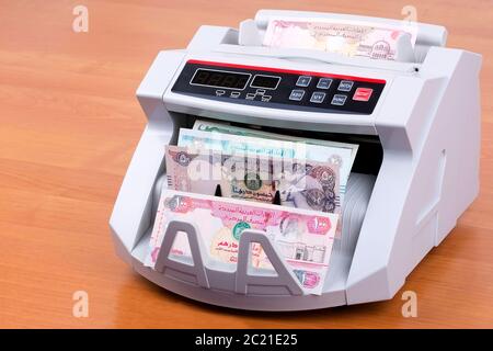 United Arab Emirates Dirham in a counting machine Stock Photo