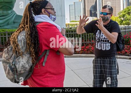 Detroit, United States. 15th June, 2020. Detroit, Michigan - Deaf people talk with sign language before a Black Disabled Lives Matter protest. Credit: Jim West/Alamy Live News Stock Photo