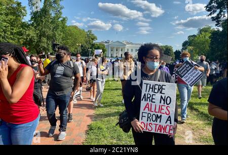 June 14, 2020, Washington D.C, District of Columbia, U.S: Angry protestors celebrate Trumpâ€™s Birthday on his front lawn at Lafayette Square, a week or so after he ordered his Secret Service to tear gas peaceful protestors who were exercising their first amendment free speech rights, following the murder of George Floyd  in front of the White House. (Credit Image: © Amy Katz/ZUMA Wire)