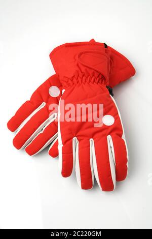Red winter ski gloves, isolated on white background Stock Photo
