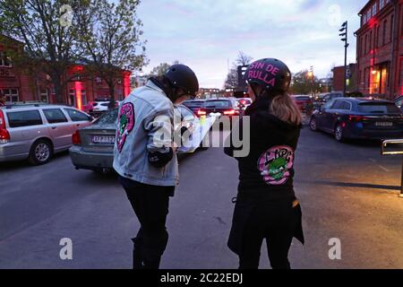 Linkoping, Sweden 20200425 Stanley Kubrick's 'The Shining' is shown at a drive-in cinema in central Linköping during Saturday night in these corona times. Staff on roller skates order candy and popcorn during the movie. Photo Jeppe Gustafsson Stock Photo