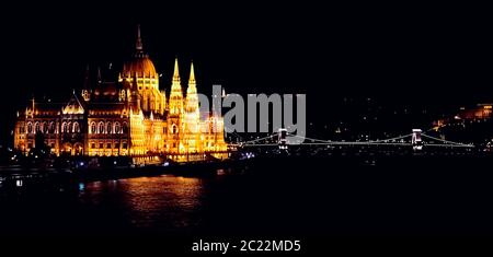 View of the Budapest parliament and Chain bridge at night time