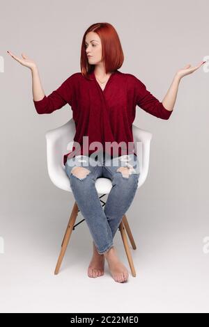 Business woman wearing in red having passive emotion and looking frustrated. Stock Photo