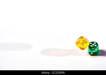 colorful dices in motion on white background Stock Photo