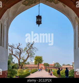 View of the grounds through a gate looking towards Moti Masjid, Agra Fort, Agra, Uttar Pradesh, India Stock Photo