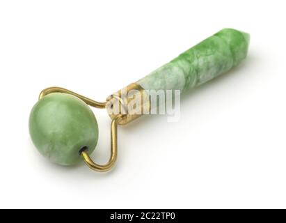 Jade facial massage roller isolated on white Stock Photo