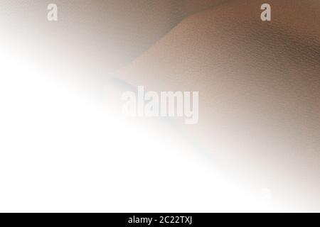 Brown fabric background with white glow , space for text moody Stock Photo