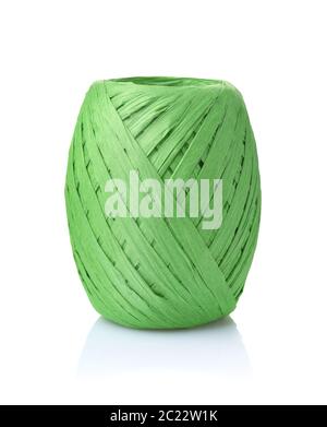 Skein of green raffia paper ribbon isolated on white Stock Photo