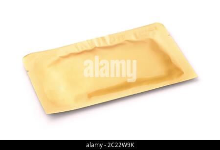 Golden sealed cosmetics sachet isolated on white Stock Photo