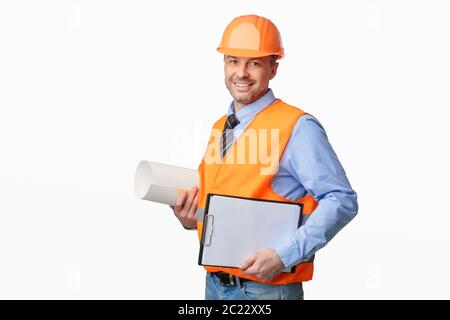 Architect Holding Building Plan Papers Standing On White Background Stock Photo