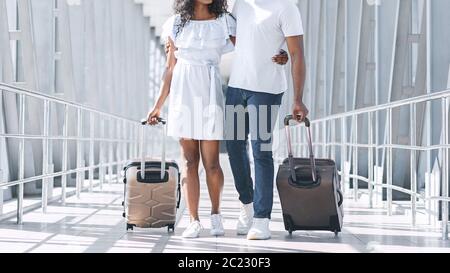 Just Married Black Couple Walking With Suitcases In Airport, Going To ...