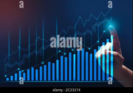 Hand Touching Financial Growth Graph On Virtual Panel, Blue Background Stock Photo