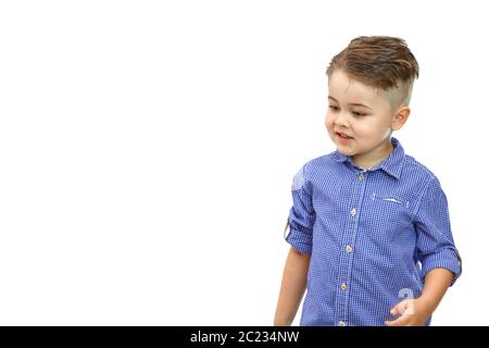 Portrait of fashionable little boy in blue shirt. Isolated on white background Stock Photo