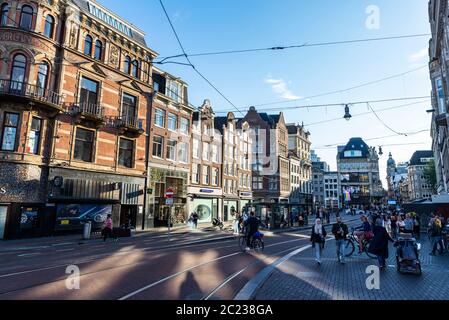 Amsterdam, Netherlands - September 9, 2018: Shopping street with people around in the old town of Amsterdam, Netherlands Stock Photo