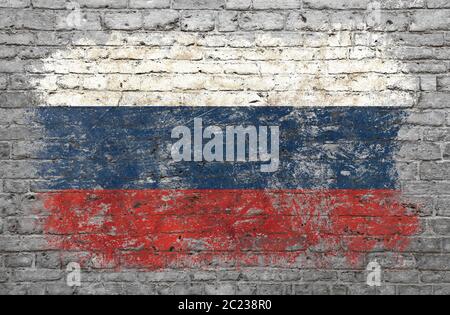 Grunge distressed flag of Russian Federation painted on old weathered grey brick wall Stock Photo
