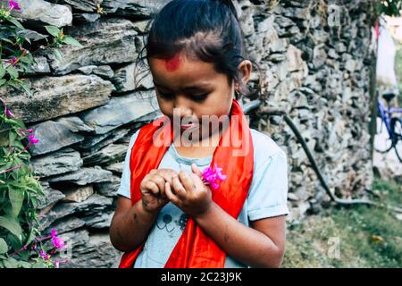 Bandipur Nepal October  15, 2018 Closeup of young children playing and having fun together in Bandipur in the afternoon Stock Photo
