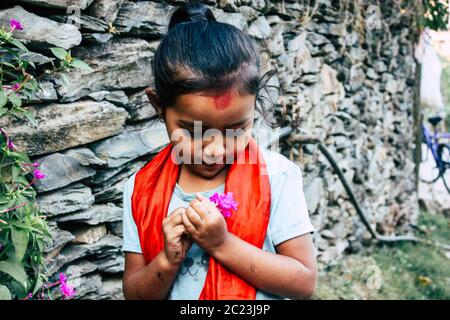 Bandipur Nepal October  15, 2018 Closeup of young children playing and having fun together in Bandipur in the afternoon Stock Photo